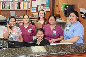 The nurses at the desk of River Valley Care Center