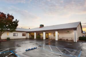 The front entrance and parking lot at River Valley